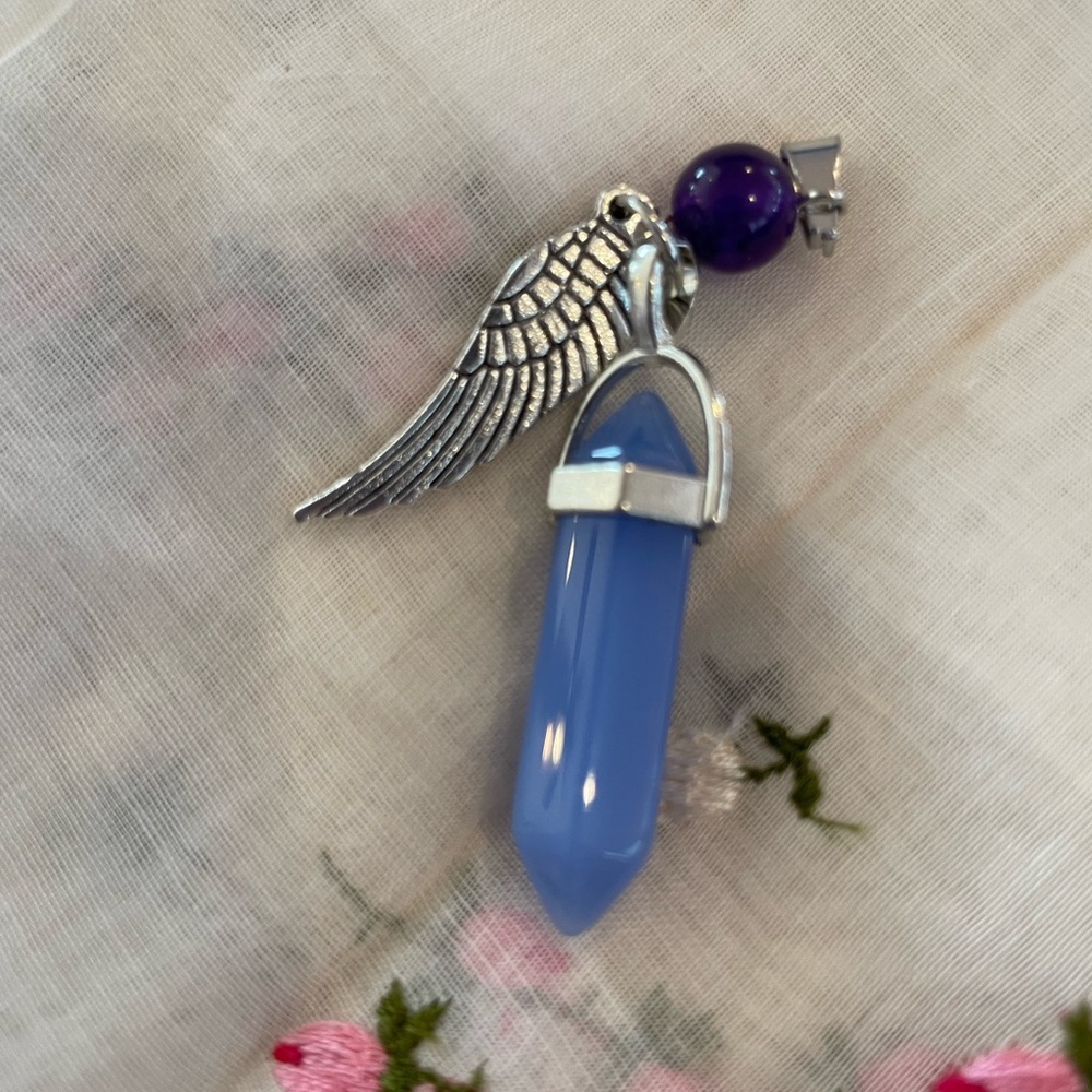 Beautiful blue crystal point with an angel wing & purple bead Pendulum pendant
